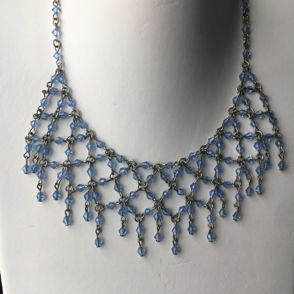 Crystal and sliver bib necklace.